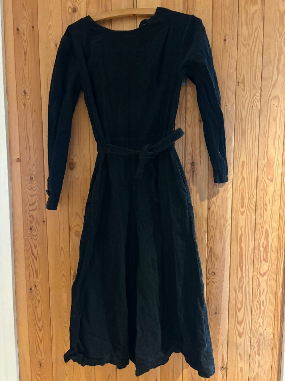 Black Corduroy Jumpsuit with Long Sleeves and Wide Legged Pant